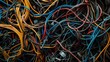 Close-up of tangled wires in a messy pile