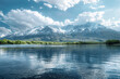 A serene lake surrounded by snow-capped mountains under a cloud-streaked sky, isolated on solid white background.