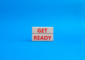 Wall Mural - get ready symbol. wooden blocks with words get ready. beautiful blue background. business and get re