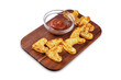 Roasted potato in the form of heart with ketchup sauce in a plate for Valentine's day on a white isolated background