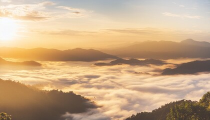 Wall Mural - natural fog and mountains sunlight background blurring misty waves warm colors and bright sun light christmas background sky sunny color orange light patterns abstract flare evening on clouds blur