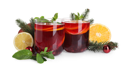 Wall Mural - Christmas Sangria drink in glasses, fir branches, fruits and baubles on white background