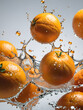 orange falling in water splash
