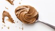 Top view of a perfectly detailed spoon of creamy nut butter, highlighting its smoothness and sheen, isolated on a white background, studio lighting