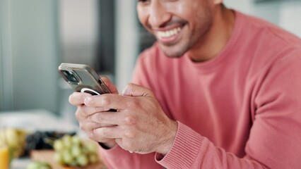 Poster - Man, smartphone and typing with laugh in kitchen with funny video or social media app in house. Online, texting and relax on weekend with comedy or good news notification with chatting in Canada
