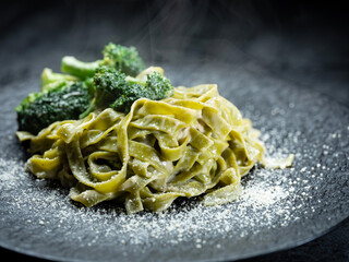 Wall Mural - Spinach cream pasta on plate