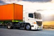 Semi Trailer Trucks Driving on The Road with The Sunset. Cargo Container Shipping. Economical Transportation Business. Commercial Truck Transport. Diesel Trucks. Lorry. Freight Truck Logistic.