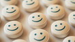Pills with drawn happy faces on white background