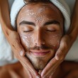 © Myname - A man is having a facial treatment and provides skin care to remove dead skin cells, brighten the skin and make it glow, relaxation