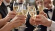 © enterdigital - A group of people are toasting with champagne glasses.