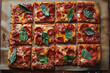 Birds eye view of a pizza cut into squares unconventional and playful  