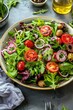 Fresh salad with arugula, cherry tomatoes, red onion and black olives