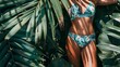 © liliyabatyrova - A woman is posing in a bikini in a jungle setting