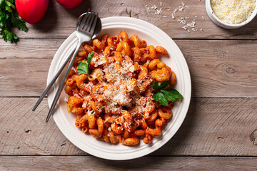 Wall Mural - Cavatappi pasta with tomato sauce and parmesan cheese