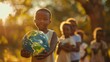 International day of peace concept with African Children holding earth globe. Group of African children holding planet earth over blurry nature background with copy space hyper realistic 