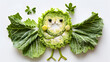 smiling happy Bird shape made from cabbage leaves