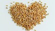 Heart made from barley seeds white background
