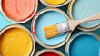© Luluraschi - top view of Paint cans and brushes and how to choose the perfect interior paint color that is good for your health