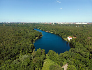 Wall Mural - Aerial landscape of lake and Jagdschloss Grunewald in forest on a sunny summer day in Berlin