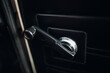 Handles for manually opening windows in a classic car