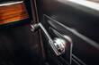 Handles for manually opening windows in a classic car