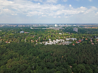 Wall Mural - Aerial landscape of Grunewald forest and city skyline on a sunny day in Berlin