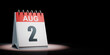 August 2 Calendar Spotlighted on Black Background