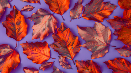 Wall Mural - Pattern of dry orange metallic leaves on violet background