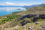 Fototapeta Uliczki - Montenegro, view of Skadar Lake National Park. Karst mountains and  vast freshwater lake Skadar on sunny spring day