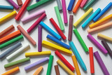Fototapeta Uliczki - Colorful oil pastel crayons on white paper