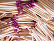 Matchstick Detail. Purple-tipped wooden matches, close-up view. Uses for Fire prevention campaigns, craft ideas.