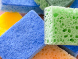Fototapeta Morze - Vibrant Scrub Sponges. Brightly colored sponges with a focus on texture. Uses for Online retail, cleaning tutorials.