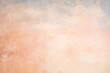 Soft peach watercolor wash with vintage textures, creating a romantic background for various creative projects.