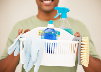 Sticker - Man, cleaning and closeup with gloves and basket in studio, container and soap for hygiene. Male cleaner or worker with chemical and cloth for washing, hospitality service on backdrop for career