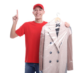 Sticker - Dry-cleaning delivery. Happy courier holding coat in plastic bag and pointing at something on white background