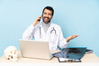 Professional traumatologist in workplace keeping a conversation with the mobile phone with someone