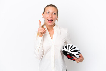 Wall Mural - Business caucasian woman with a bike helmet isolated on white background thinking an idea pointing the finger up