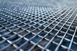A detailed view of a metal grate on a table. Suitable for industrial themes