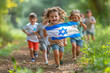 © irina - Happy children running with Israeli flag during Independence Day celebration.