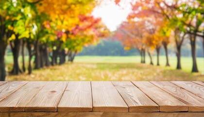 Wall Mural - wooden table top with blur background of autumn