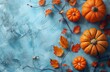 Pumpkins and Leaves Painting on Blue Background