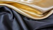 black and gold silk satin fabric abstract background