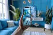 © DWN Media - Hand holding an iPhone with augmented reality being used to show an interior design of the house in 3D. A virtual view inside a room showing furniture and home decor on the screen with blue lighting