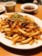 Delicious asian-style chicken and french fries dish
