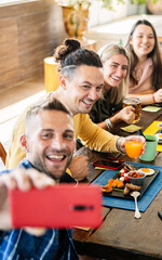 Wall Mural - Diverse young people taking selfie group portrait while having breakfast at rooftop bar