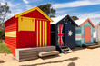 Beautiful bathing houses on white sandy beach at Brighton in Melbourne, Australia.