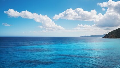 View from the beach to the blue tropical ocean, sunny day, blue clouds, summer composition, calm and beautiful summer landscape, Concept of travel, vacation, tourism, tour