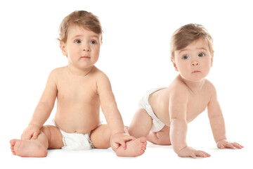 Poster - Portrait of cute twin babies on white background