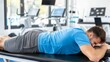 man lying prone, suffering from Back Pain. bad posture, office syndrome backache, and stress of the body.