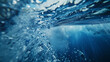 Wave on moving water surface close up in the middle of the screen. Under Water Surface in the middle of the sea
